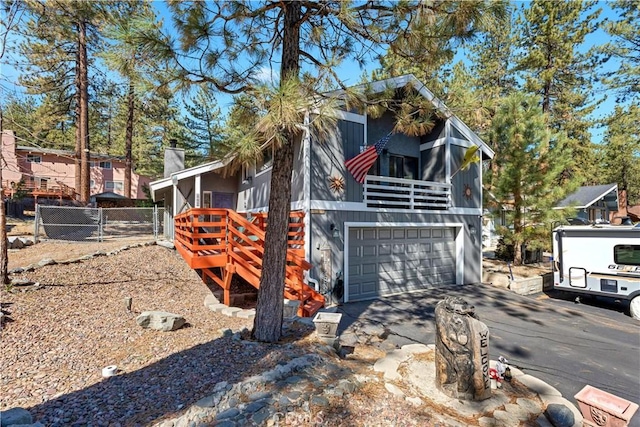 1799 Betty St, Wrightwood, CA 92397 - view of front of house with aphalt driveway, a garage, and fence