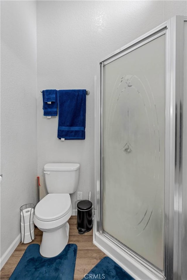 1799 Betty St, Wrightwood, CA 92397 - full bath featuring a shower stall, wood finished floors, baseboards, and toilet