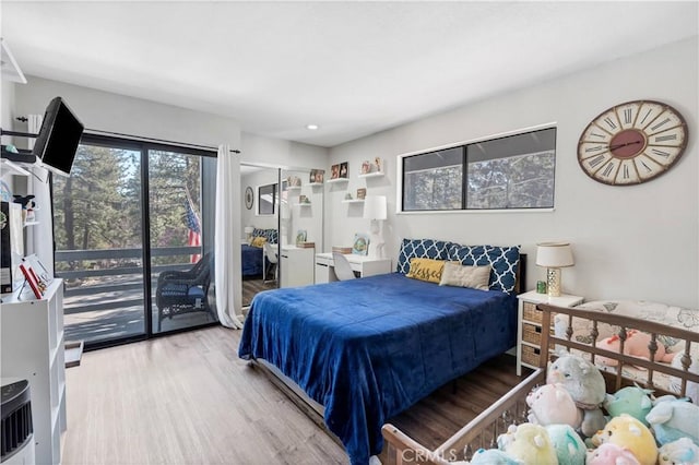 1799 Betty St, Wrightwood, CA 92397 - bedroom featuring access to exterior and wood finished floors