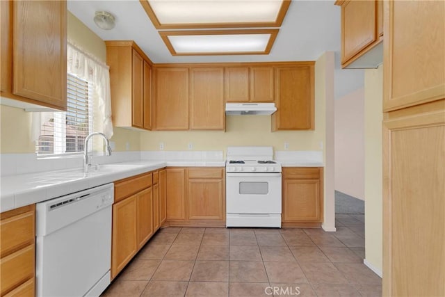 19071 Stoddard Way, Apple Valley, CA 92308 - kitchen with white appliances, under cabinet range hood, tile counters, and light tile patterned floors