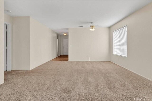 19071 Stoddard Way, Apple Valley, CA 92308 - carpeted spare room with a ceiling fan and a smoke detector