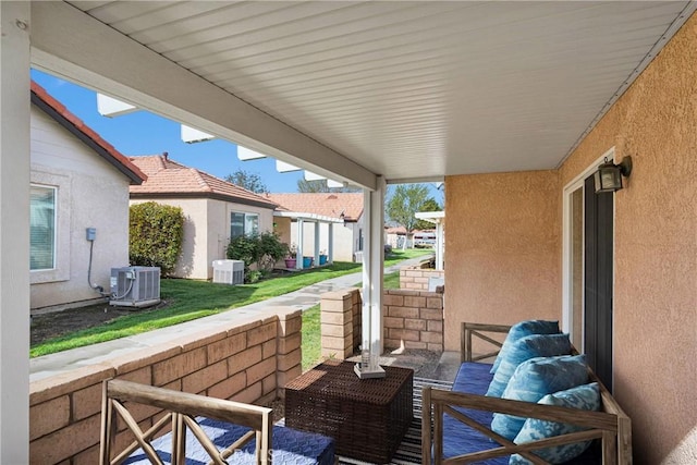 19071 Stoddard Way, Apple Valley, CA 92308 - view of patio featuring an outdoor living space and a residential view