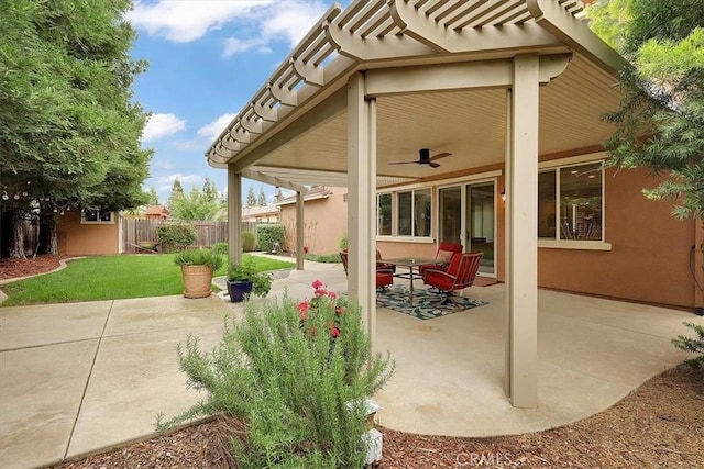 view of patio / terrace with a pergola, fence, and ceiling fan