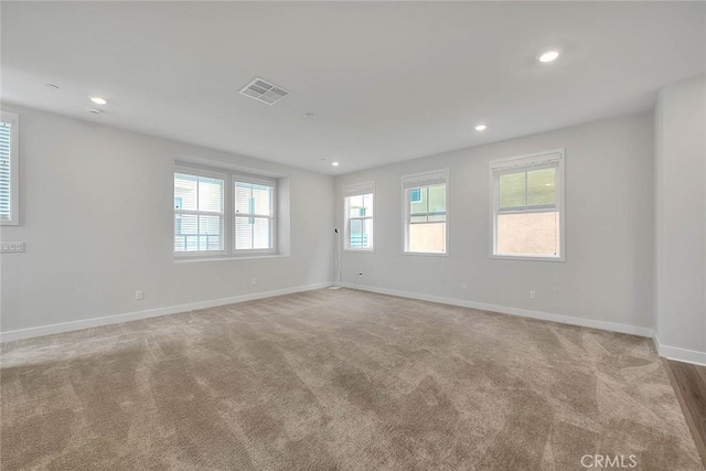 6 Crown Point Dr, Rancho Mission Viejo, CA 92694 - spare room featuring visible vents, baseboards, recessed lighting, and light carpet