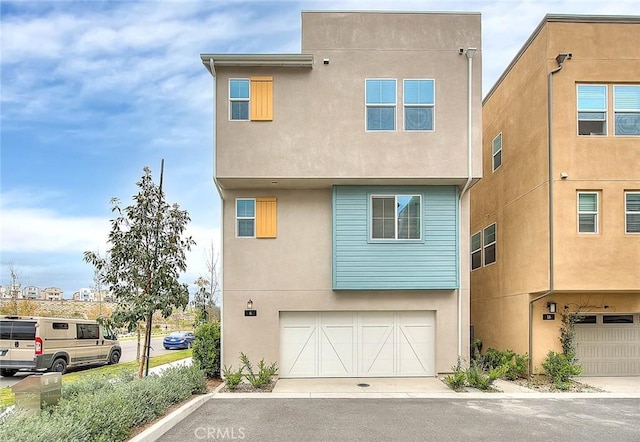 6 Crown Point Dr, Rancho Mission Viejo, CA 92694 - view of front of property with an attached garage and stucco siding