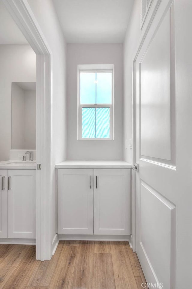 6 Crown Point Dr, Rancho Mission Viejo, CA 92694 - interior space with a sink and light wood-style floors