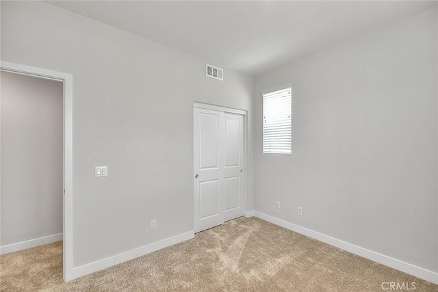 6 Crown Point Dr, Rancho Mission Viejo, CA 92694 - unfurnished room with light carpet, visible vents, and baseboards