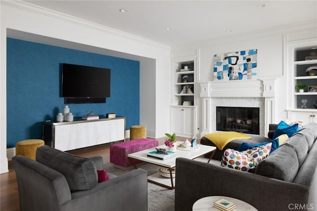 28 Old Course Dr, Newport Beach, CA 92660 - living area featuring built in features, wood finished floors, crown molding, a high end fireplace, and recessed lighting