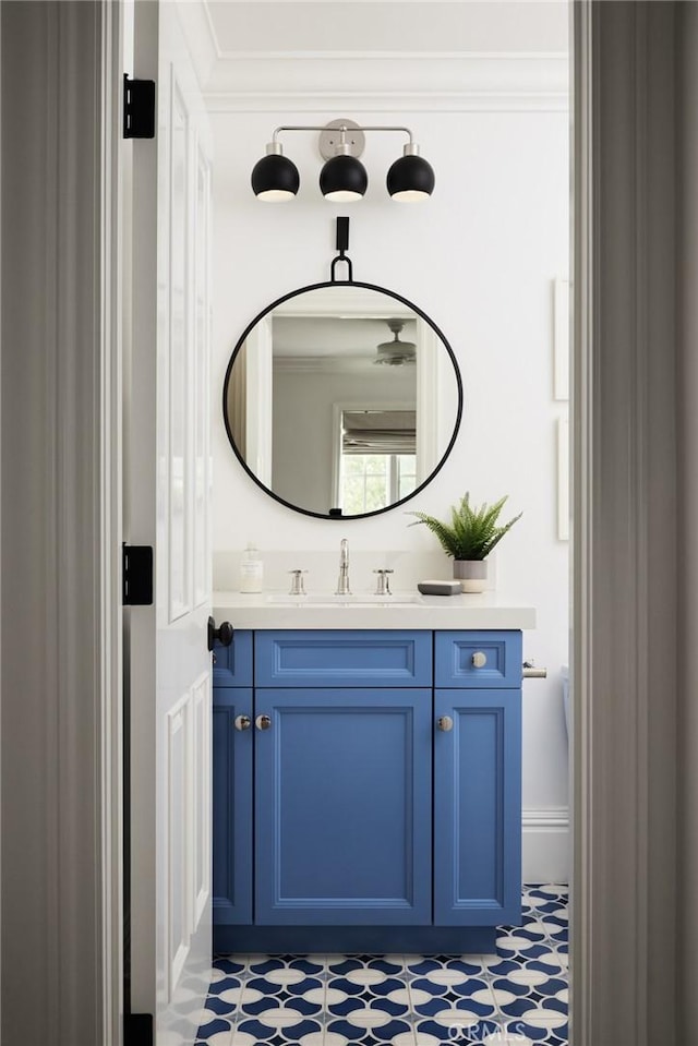 bathroom with tile patterned floors and vanity