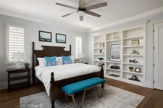 bedroom with crown molding, ceiling fan, wood finished floors, and baseboards