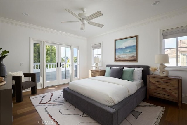 bedroom featuring french doors, access to exterior, wood finished floors, and multiple windows