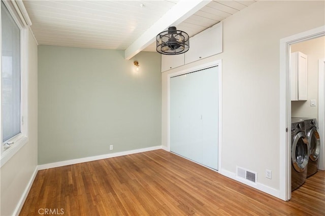 1503 Calle Sacramento, San Clemente, CA 92672 - washroom featuring cabinet space, wood finished floors, washer and clothes dryer, and baseboards