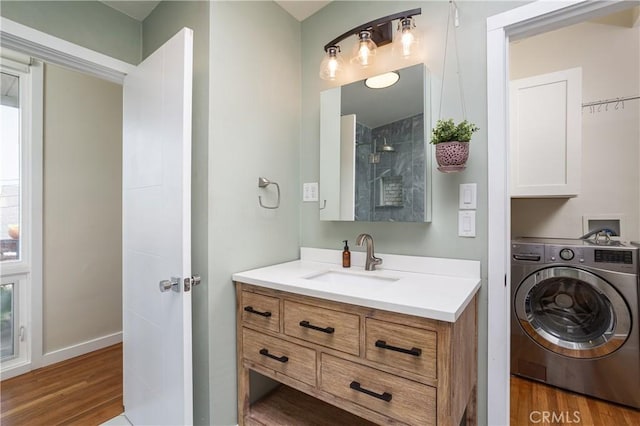 1503 Calle Sacramento, San Clemente, CA 92672 - full bathroom with washer / dryer, wood finished floors, vanity, baseboards, and a shower