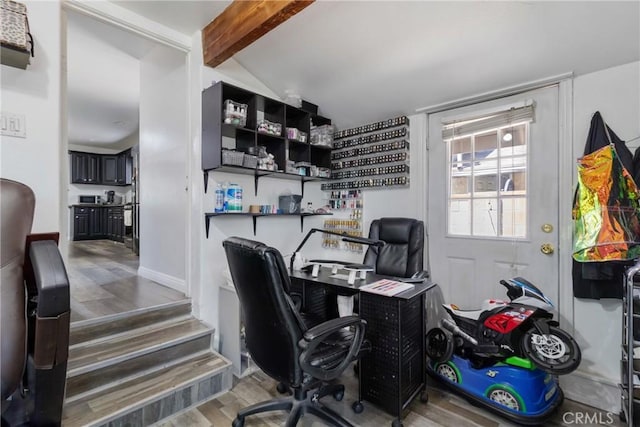 office space featuring wood finished floors and lofted ceiling with beams