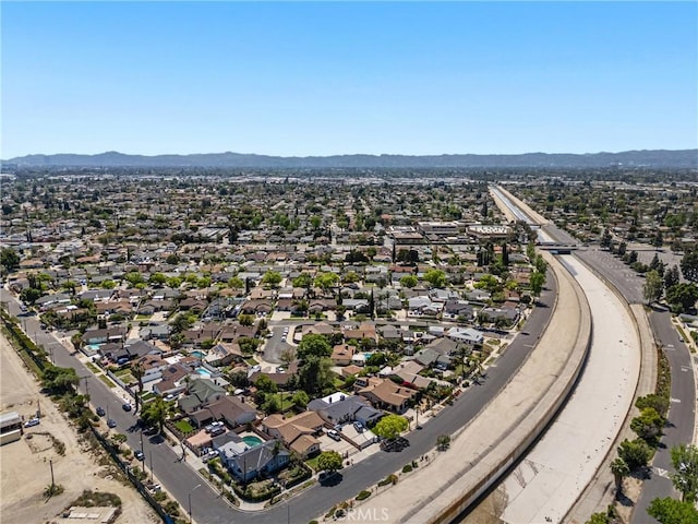 drone / aerial view with a residential view and a mountain view