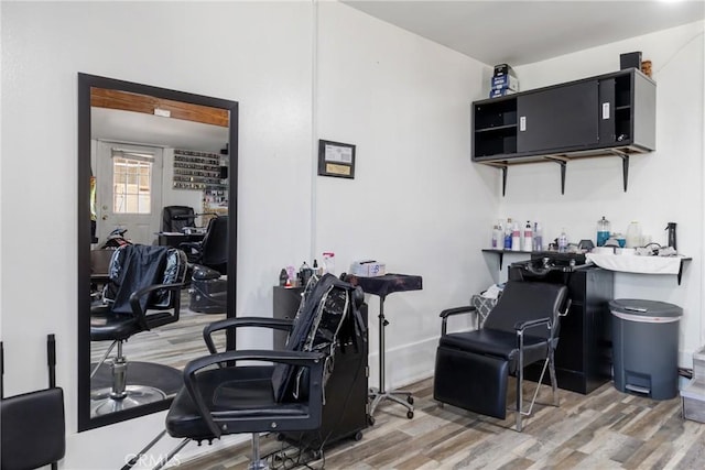 interior space featuring a dry bar and light wood-style floors
