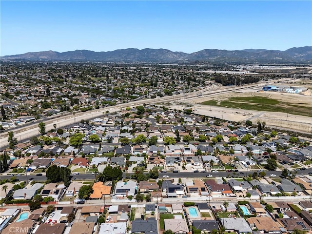 aerial view with a mountain view and a residential view