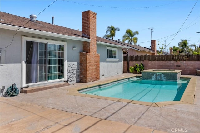view of pool with a fenced in pool, a patio area, an in ground hot tub, and fence