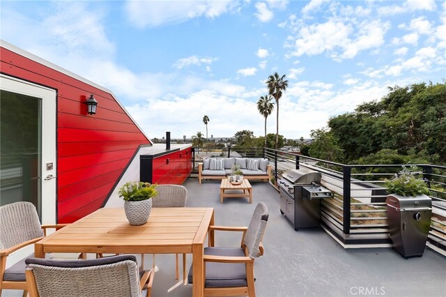 exterior space with outdoor dining area, outdoor lounge area, a grill, and a balcony