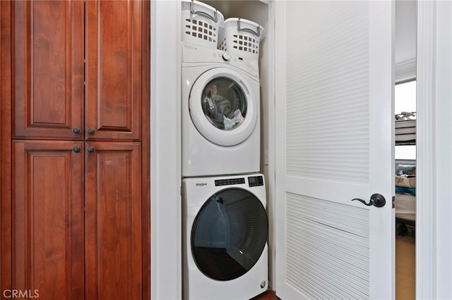 619 10th St, Hermosa Beach, CA 90254 - clothes washing area featuring stacked washer / drying machine and laundry area