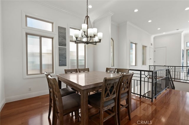 619 10th St, Hermosa Beach, CA 90254 - dining space featuring baseboards, a notable chandelier, ornamental molding, recessed lighting, and wood finished floors
