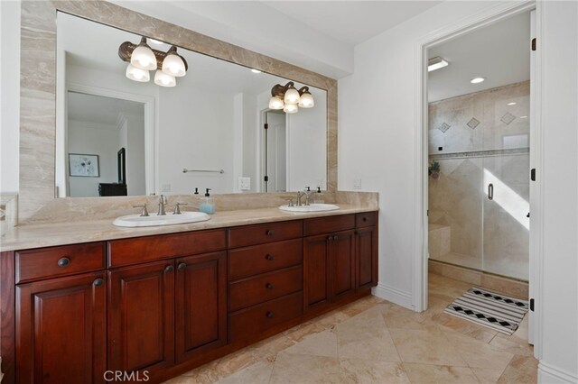 619 10th St, Hermosa Beach, CA 90254 - bathroom featuring a shower stall, double vanity, and a sink