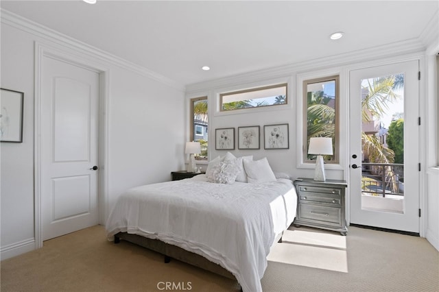 619 10th St, Hermosa Beach, CA 90254 - bedroom with light carpet, multiple windows, and access to exterior