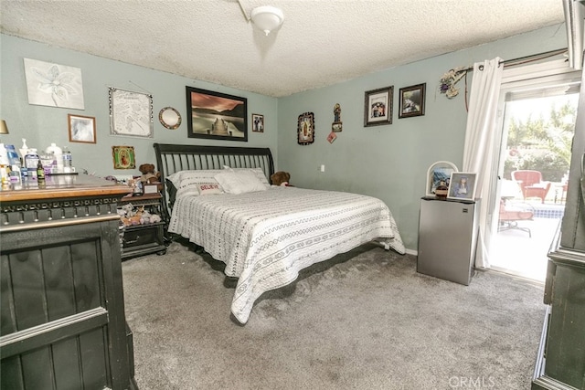 610 Woodington Dr, Lancaster, CA 93535 - carpeted bedroom with a textured ceiling and access to outside