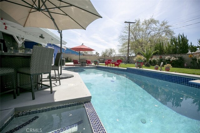 610 Woodington Dr, Lancaster, CA 93535 - view of pool with a fenced backyard and a patio area