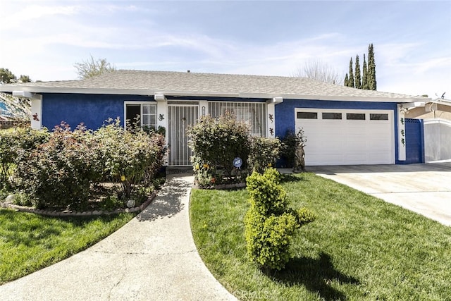 610 Woodington Dr, Lancaster, CA 93535 - ranch-style house with a garage, stucco siding, concrete driveway, and roof with shingles