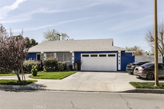 610 Woodington Dr, Lancaster, CA 93535 - single story home featuring a garage, stucco siding, driveway, and roof with shingles