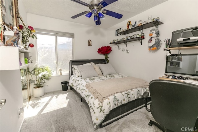 610 Woodington Dr, Lancaster, CA 93535 - carpeted bedroom with ceiling fan and a textured ceiling