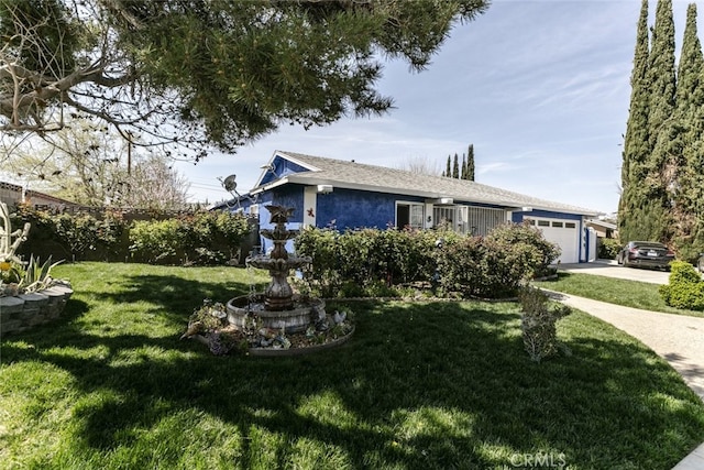 610 Woodington Dr, Lancaster, CA 93535 - view of front facade with a garage, a front lawn, concrete driveway, and stucco siding