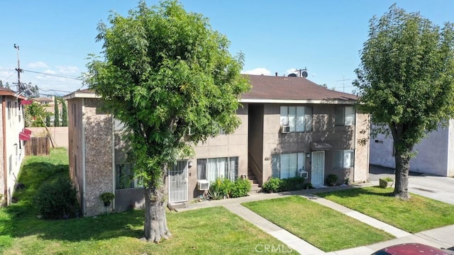 1616 Picadilly Way, Fullerton, CA 92833 - townhome / multi-family property featuring a front yard
