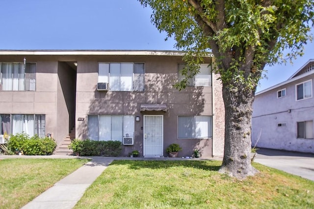 1616 Picadilly Way, Fullerton, CA 92833 - view of property featuring stucco siding, a front lawn, and cooling unit