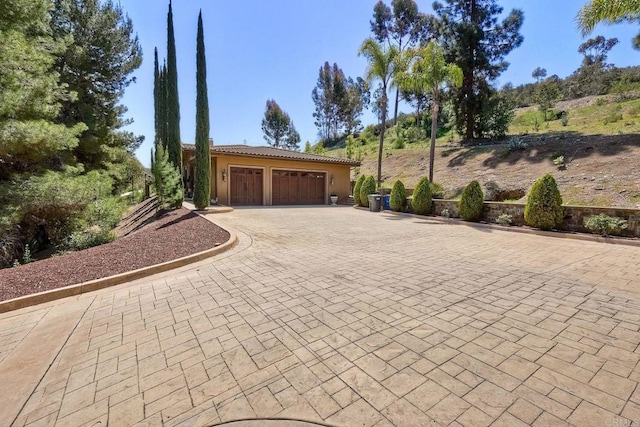 11558 Creek Rd, Poway, CA 92064 - garage with decorative driveway