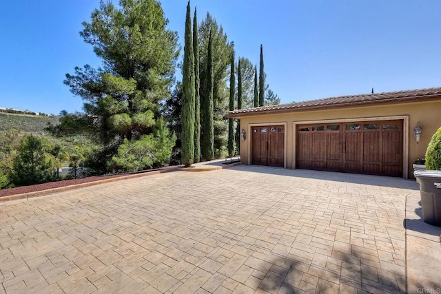 11558 Creek Rd, Poway, CA 92064 - garage with decorative driveway