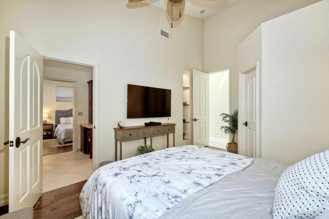 11558 Creek Rd, Poway, CA 92064 - bedroom featuring a towering ceiling and wood finished floors