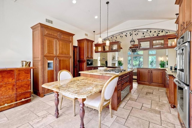 11558 Creek Rd, Poway, CA 92064 - kitchen featuring vaulted ceiling, a warming drawer, brown cabinetry, stone tile floors, and stainless steel gas cooktop