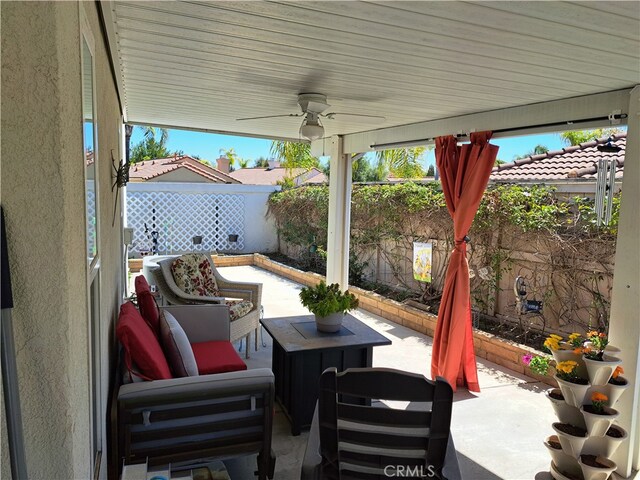 23796 Corte Picante, Murrieta, CA 92562 - view of patio featuring a fenced backyard, ceiling fan, and an outdoor hangout area