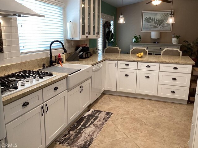 23796 Corte Picante, Murrieta, CA 92562 - kitchen featuring extractor fan, a sink, white appliances, and hanging light fixtures