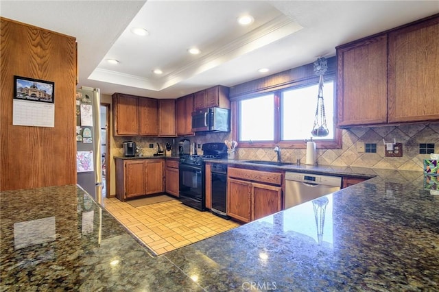 7191 Slater Ave, Huntington Beach, CA 92647 - kitchen featuring a raised ceiling, a sink, ornamental molding, appliances with stainless steel finishes, and backsplash