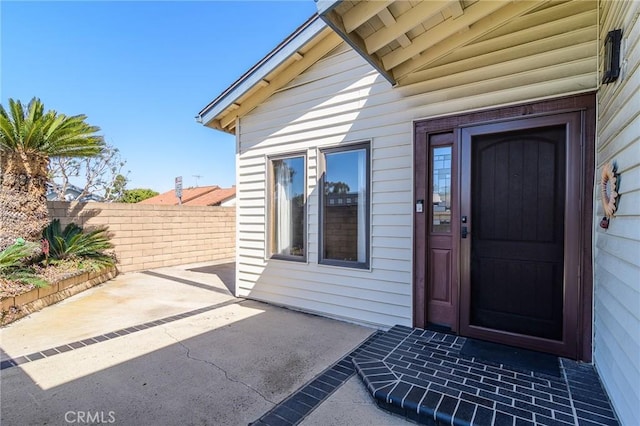 7191 Slater Ave, Huntington Beach, CA 92647 - entrance to property with a patio and fence