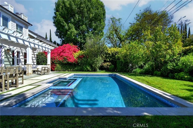 view of swimming pool with a lawn, a pergola, a patio, and a pool with connected hot tub