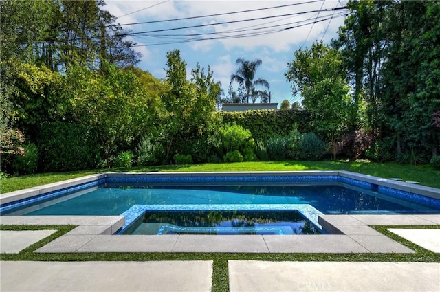 view of pool with a pool with connected hot tub