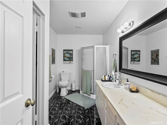 12720 Burbank Blvd Unit 323, Valley Village, CA 91607 - full bathroom featuring marble look tiles, vanity, a stall shower, and toilet