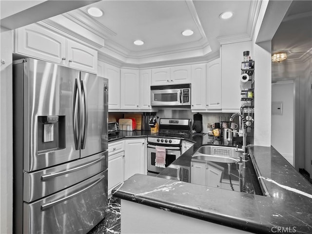 12720 Burbank Blvd Unit 323, Valley Village, CA 91607 - kitchen with stainless steel appliances, a sink, white cabinets, recessed lighting, and a raised ceiling
