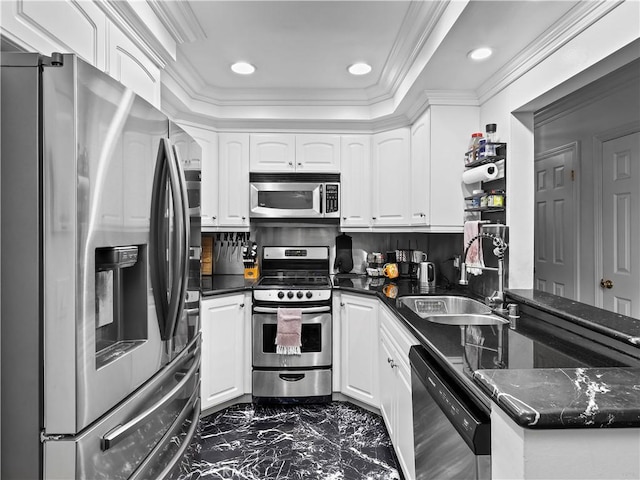 12720 Burbank Blvd Unit 323, Valley Village, CA 91607 - kitchen featuring stainless steel appliances, dark marble finish flooring, a sink, white cabinetry, and crown molding