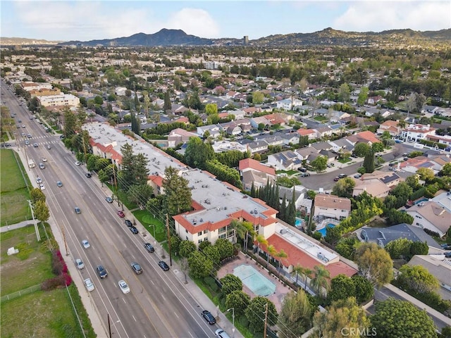 12720 Burbank Blvd Unit 323, Valley Village, CA 91607 - aerial view of residential area featuring a highway and mountains