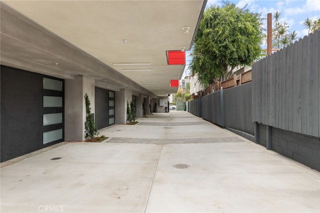 exterior space with concrete driveway